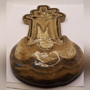 Handcrafted pottery wall pocket.